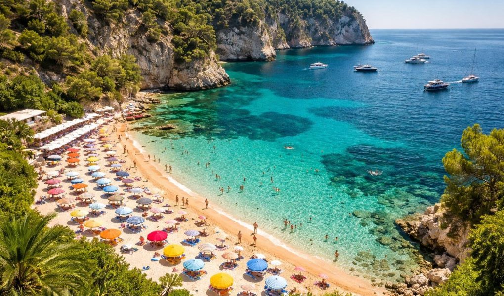 plage-mala-sable-eaux-turquoise-parasols